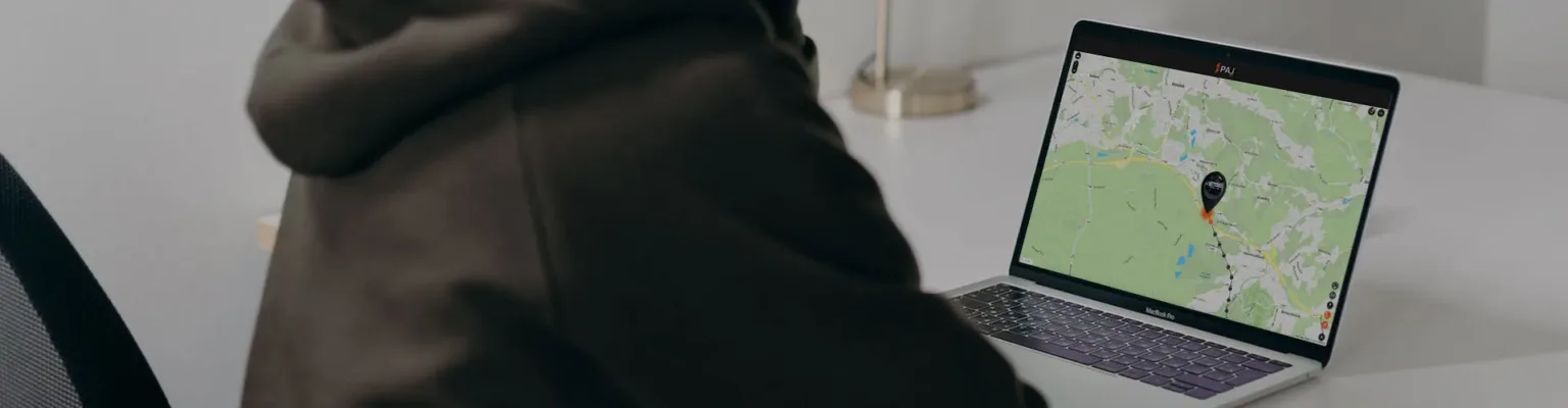 A man on his laptop checking the Finder Portal application