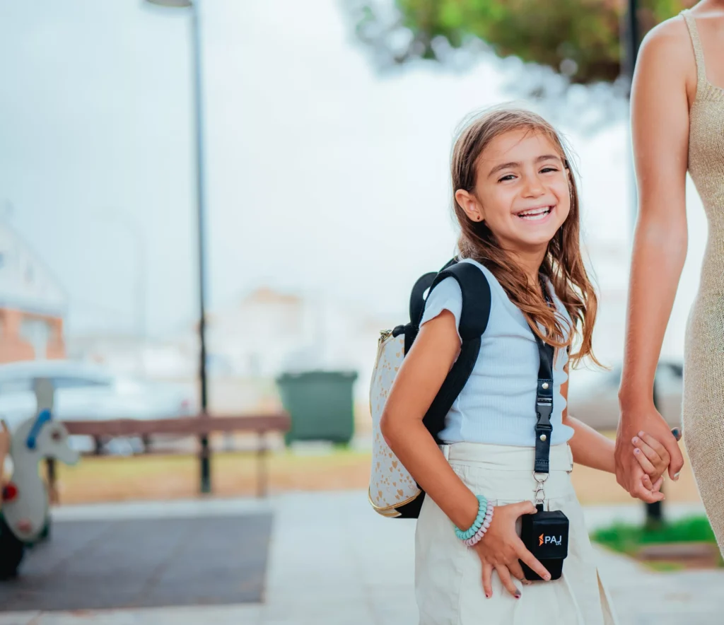Kid on her way to school wearing GPS tracker