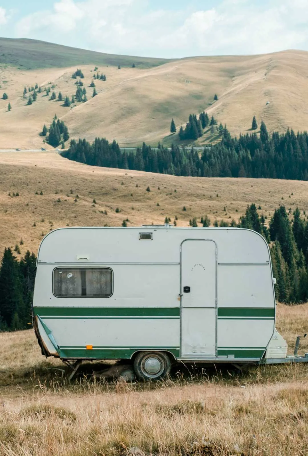 A caravan near a haystack