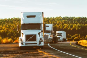 three truck back to back on the road having gps tracker for real time tracking